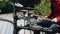 Beautiful close-up of a drummer playing in nature. Very cool notable shots.