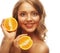 Beautiful close-up young woman with oranges