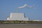 Beautiful closeup bright view of Covanta Plant Dublin Waste to Energy against clear blue sky seen from Sandymount Beach, Dublin