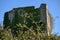 Beautiful closeup view of the mysterious Puck`s Castle ruins covered with ivy Hedera Helix in Rathmichael, Southeastern Dublin