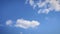 Beautiful clouds against blue sky, time lapse. Clouds moving fast against summer sky. Cloudscape timelapse