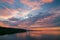 Beautiful clouds and colorful water in lake reflected in evening