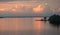 Beautiful clouds and colorful water in lake reflected in evening