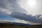 Beautiful clouds over the hilly landscapes of Iceland