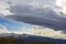 Beautiful clouds over the hilly landscapes of Iceland. Nature and places for wonderful travels