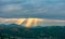 Beautiful clouds with ray of sunlight breaking through clouds