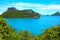 Beautiful clouds shores and blue ocean, mountin green trees