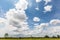 Beautiful clouds in the sky with rice paddy fields in thailand afternoon sunlight