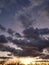 Beautiful cloudscape in the countryside. The clouds have rich colors giving them a majestic look.