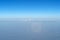 Beautiful cloudscape with magic halo from plane window