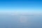 Beautiful cloudscape with magic halo from plane window