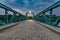 Beautiful cloudy morning before sunrise over water dam with bridge at Bartoszowice