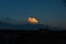 Beautiful cloudy sky in the evening. Buildings silhouette