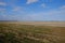 Beautiful cloudy sky over farmland. Spring landscape