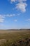 Beautiful cloudy sky over farmland. Spring landscape