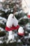 Beautiful clusters of red mountain ash covered with a snow cap. Blurred background