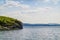 Beautiful coast in Jorpeland cliffs. Blue water and a rocky shore.