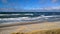 Beautiful coastal panorama - a lot of waves, sand and dunes