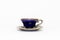 Beautiful cobalt blue colored vintage porcelain tea cup with gold ornament