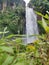 The beautiful Coban Talun waterfall located in Batu City, East Java in the photo at noon