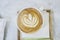 Beautiful coffee art with milk foam shaped tulip