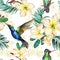 Beautiful colibri, yellow plumeria flowers and palm leaves on white background. Exotic tropical seamless pattern.