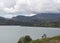 Beautiful colombian blue and reservoir landscape with andean mountain range