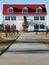 Beautiful Colonial Country Home with White Siding Red Roof