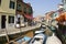 Beautiful colored houses of the old fishermans city Burano in t
