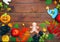 Beautiful colorful background for Halloween with gingerbread, autumn foliage, fruits and berries