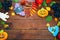 Beautiful colorful background for Halloween with gingerbread, autumn foliage, fruits and berries