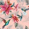 Beautiful colorful flying hummingbirds and red flowers on pink background. Exotic tropical seamless pattern. Watecolor painting.