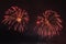 Beautiful colorful holiday fireworks on the black sky background, long exposure