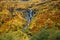 Beautiful colorful landscape in the mountains of ski resort in autumn season, trekking and hiking in the caucasian