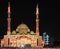 Beautiful colorful lights displaying Islamic Eastern patterns on a mosque in the city - Beautiful Sharjah lights festival