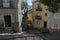 Beautiful and colorful old buildings in the Alfama Neighbourhood and the Tagus River on the background on a sunny day