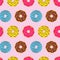 Beautiful colorful rainbow cute donuts circle realistic many taste pattern on pink