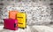 Beautiful Colorful suitcases on wall background
