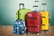 Beautiful Colorful suitcases on wooden floor