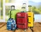 Beautiful Colorful suitcases on wooden floor