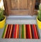 Beautiful Colorful Vertical striped Printed Welcome zute doormat outside home with yellow flowers and leaves