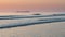 Beautiful colorful vibrant sunrise over low tide beach landscape