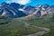 Beautiful colorful view of Polychrome Pass and a braided winding river in Denali National Park in Alaska