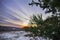 Beautiful colorful winter landscape sunset sky. Unusual weather phenomenon with stretched clouds.