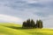 Beautiful colors of green spring panorama landscape of Tuscany. Most popular place in Italy. Green fields and blue sky and Cypress