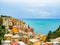 Beautiful colourful historic houses on the hills of Manarola, a popular tourist attraction destination, part of the famous Cinque