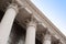 Beautiful columns of the capital on the facade of the historic building