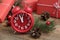 Beautiful composition with alarm clock and Christmas gifts on wooden table, closeup. Boxing day