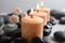 Beautiful composition with candles and spa stones