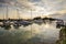 Beautiful composition view of Malaysian Harbour with a yatch during sunset.